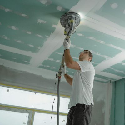 Man Polishing the Ceiling